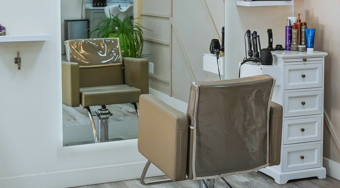 Modern salon chair and equipment at A Borgata Salon, Prescott, Arizona, US, offering a luxurious experience.