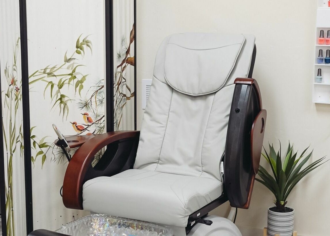 Elegant pedicure station at A Borgata Salon in Prescott, Arizona, US with comfortable chair and nail polish display.