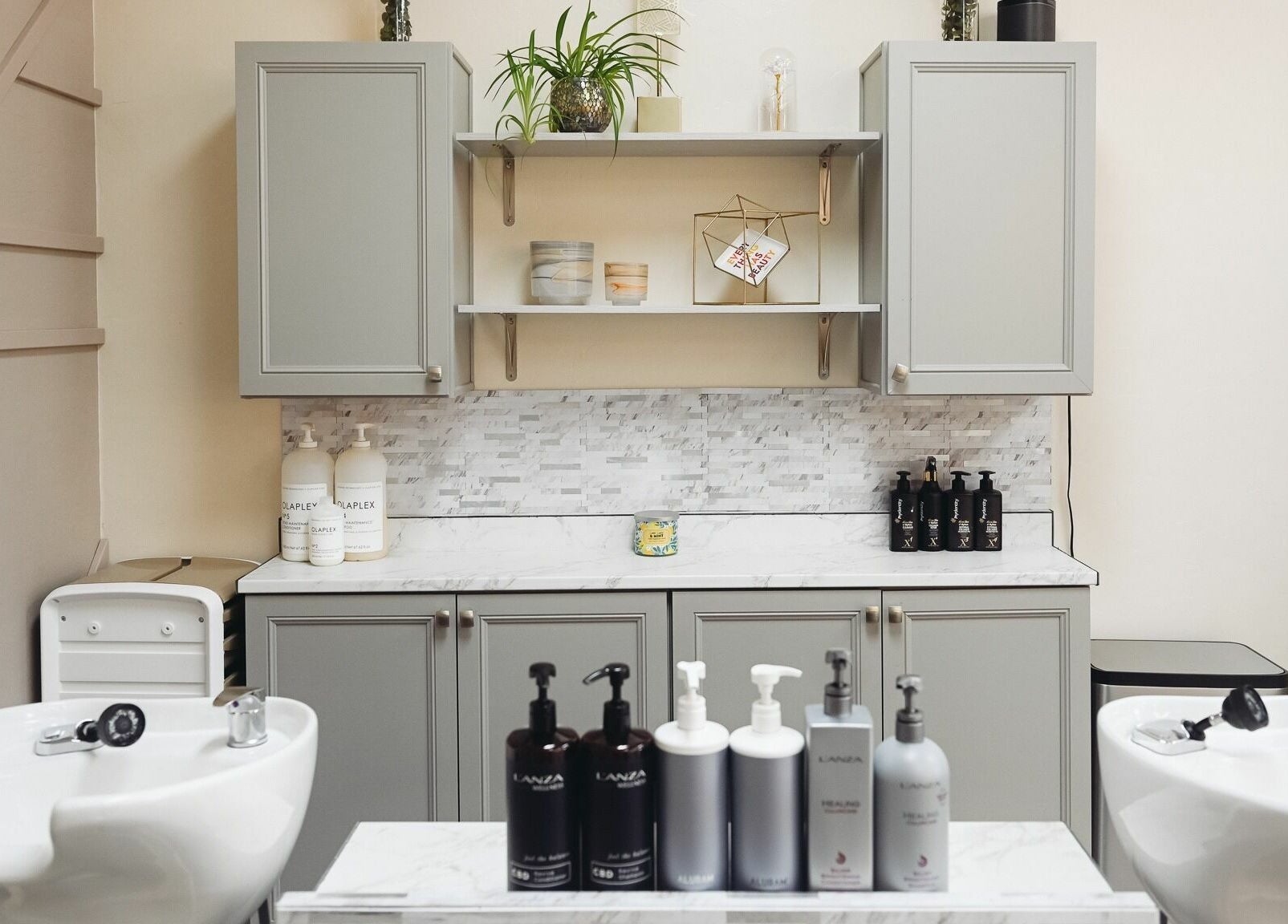 Stylish wash station at A Borgata Salon, Prescott, Arizona, US showcasing premium hair products.