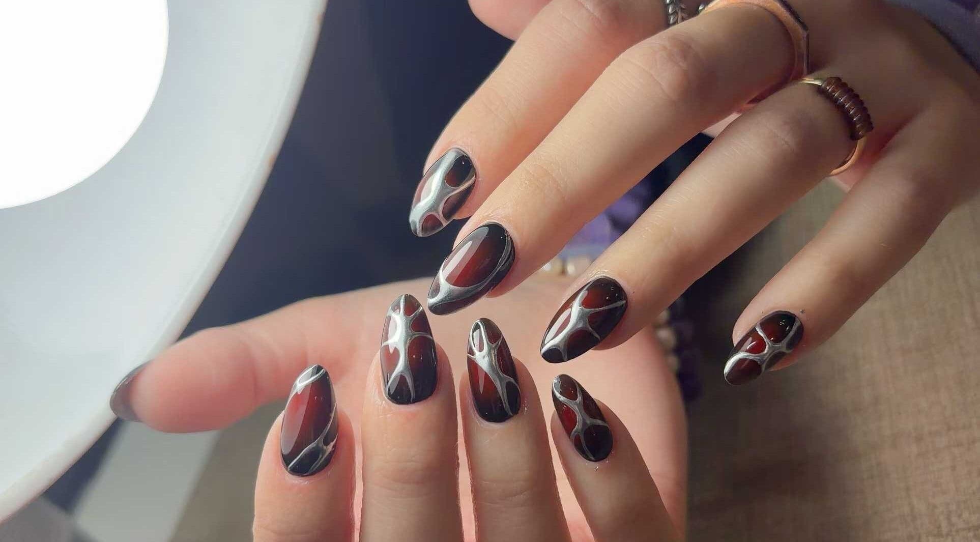 Chic nail art design at Abby Nails Finsbury Park, London, England, GB, showcasing intricate patterns.