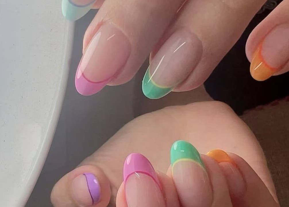 Colorful French manicure at Abby Nails Finsbury Park, London, England, GB. Stunning nail art showcase.