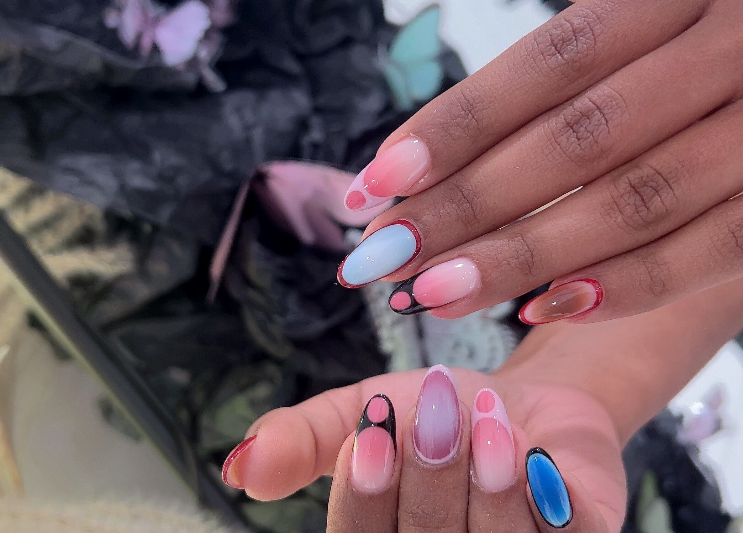 Colorful nail art at Abby Nails Leyton in London, England, GB showcasing creative and vibrant designs.