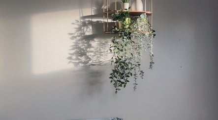 Elegant hanging plants at The Radiance Clinic, Oldham, England, GB create a serene ambiance.