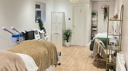 Relaxing treatment room at The Radiance Clinic in Oldham, England, GB, featuring modern decor and equipment.