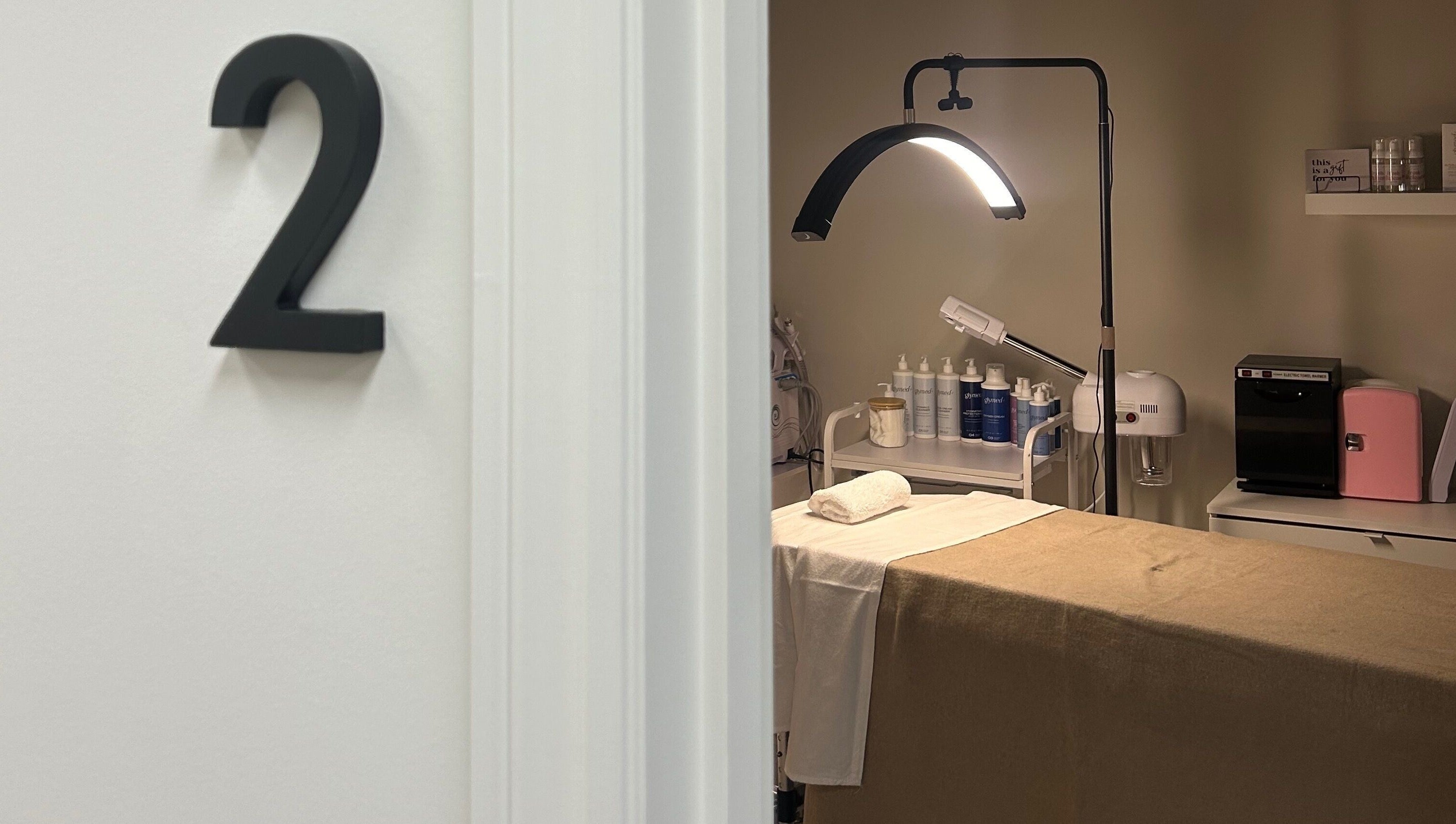 Cozy treatment room with table at Lashesxbeautybar, Vaughan, Ontario, CA.