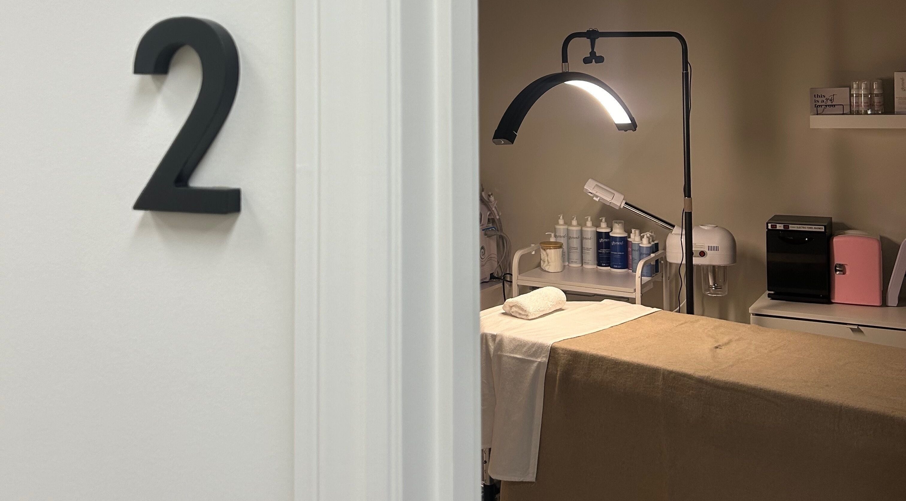 Cozy treatment room with table at Lashesxbeautybar, Vaughan, Ontario, CA.