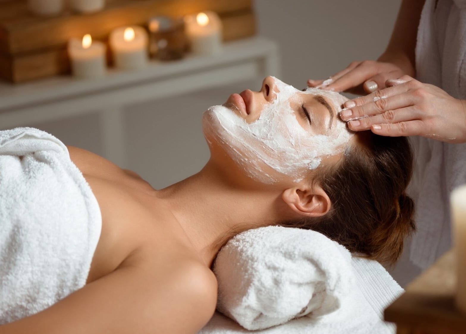 Relaxing facial treatment with candle ambiance at Selenite Beauty, Parksville, British Columbia, CA.