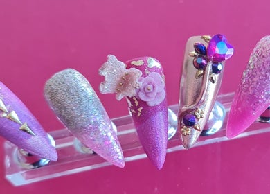 Elegant nail art at The Alchemy Lounge, Blackpool, England, GB, showcasing intricate and colorful designs.