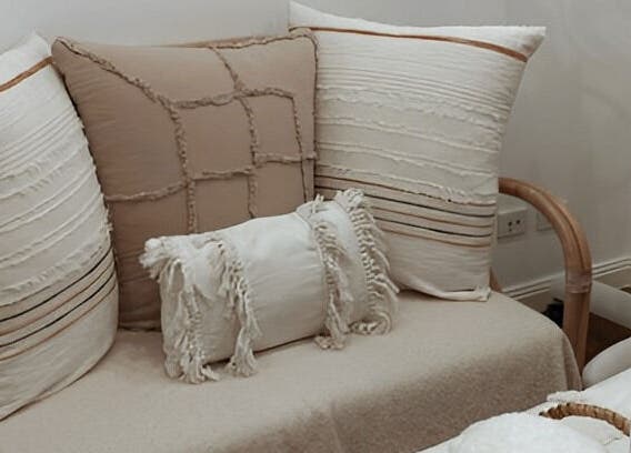 Tranquil seating area with plush cushions at 4 Elements Clinic, Melbourne, Victoria, AU.