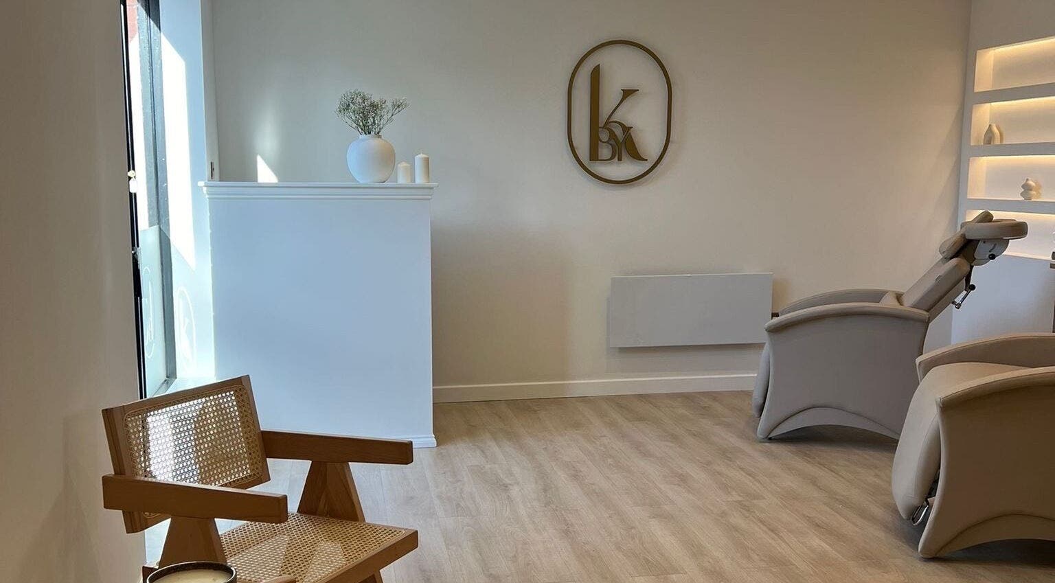Relaxing treatment room at Glossed by Holly, Coatbridge, Scotland, GB with modern decor and tranquil ambiance.