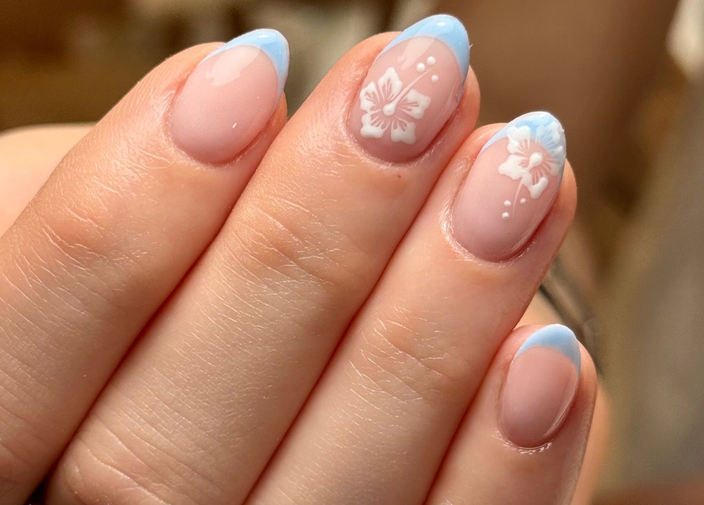 Elegant nail art with pink and blue French tips at Glossed by Holly, Coatbridge, Scotland, GB.