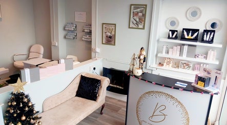 Elegant reception area at Bon Visage Aesthetics Ltd in Shepshed, Loughborough, England, GB with decor and products.