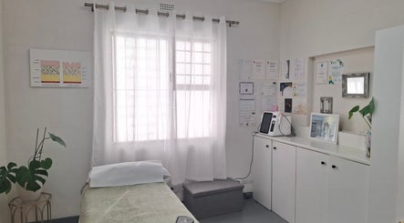 Clean treatment room at JustBe Aesthetics Skin Clinic, Cape Town, Western Cape, ZA, highlighting comfort and professionalism.