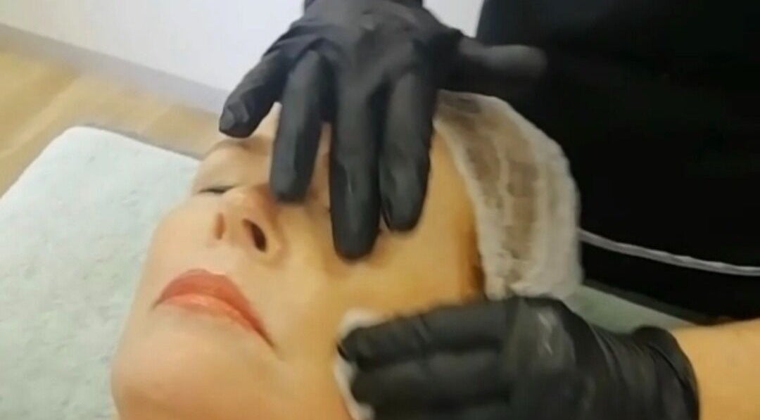Facial treatment at JustBe Aesthetics Skin Clinic, Cape Town, Western Cape, ZA enhancing relaxation.