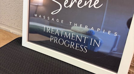Serene Massage Therapies sign in Faversham, England, GB indicating treatment in progress.