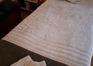Relaxing spa bed setup at AJ Massage, London, England, GB for ultimate wellness experience.