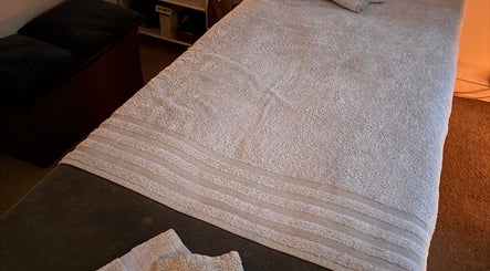 Relaxing spa bed setup at AJ Massage, London, England, GB for ultimate wellness experience.