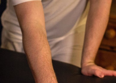 AJ Massage therapy session setup in London, England, GB highlighting professional wellness care.