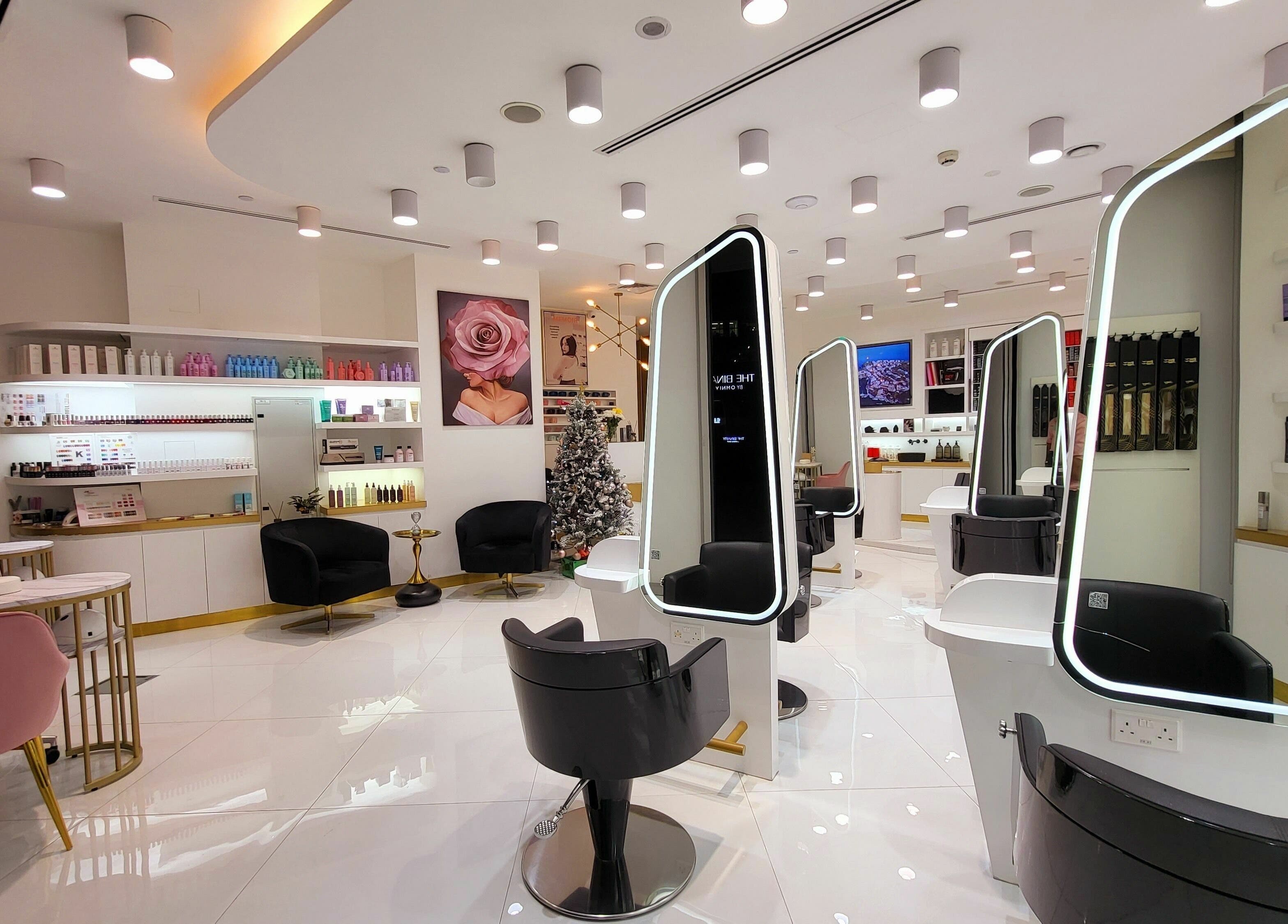 Spacious and modern interior of Memoir Beauty Salon in Dubai, Dubai, AE, showcasing luxury styling stations.