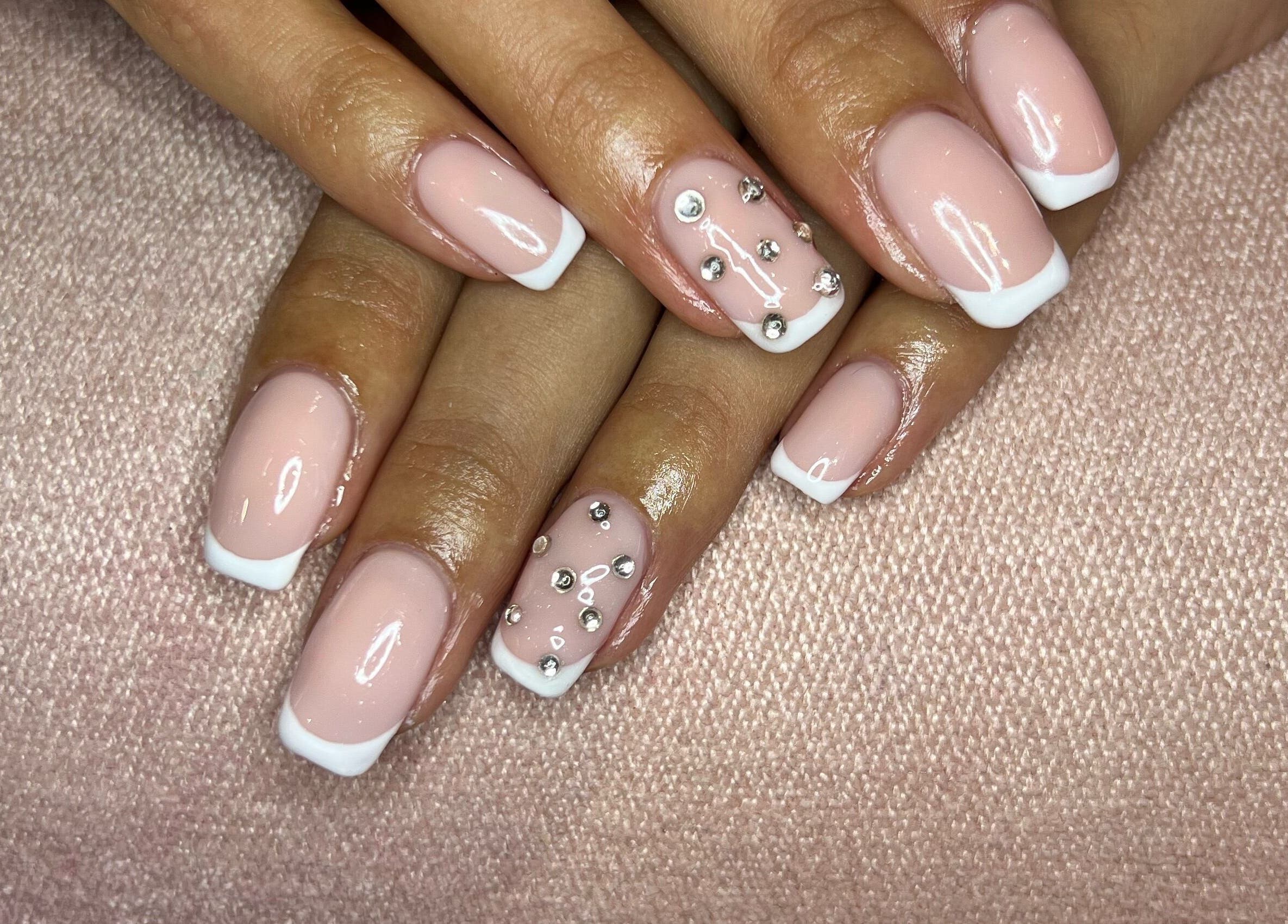 Stylish French manicure with rhinestones at Rose Blvd Beauty Bar SEA POINT, Cape Town, Western Cape, ZA.