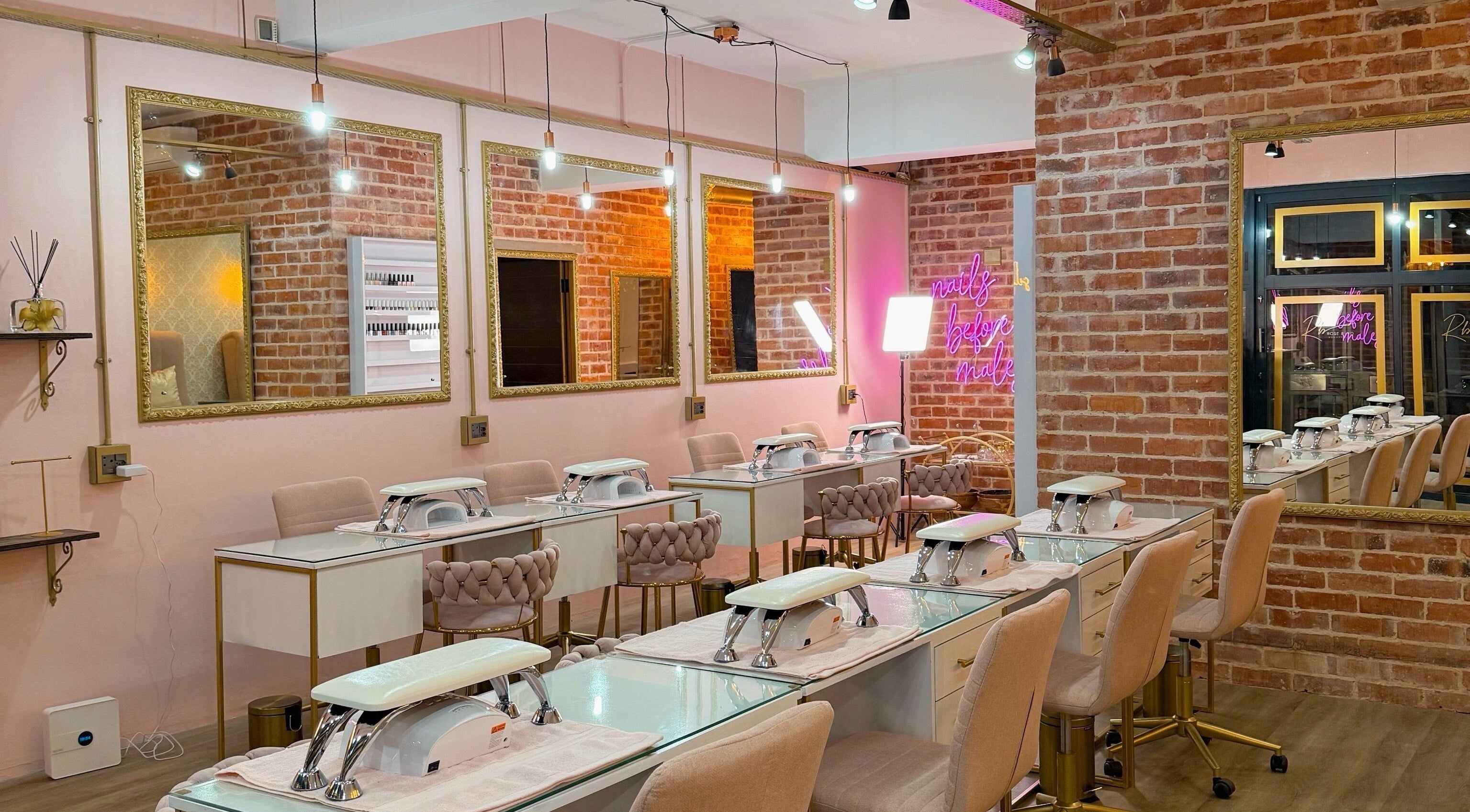 Elegant nail salon at Rose Blvd Beauty Bar Regent Road, Cape Town, Western Cape, ZA featuring plush seating.