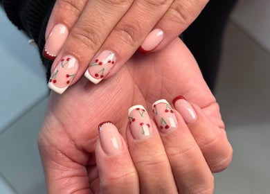 Stylish cherry nail art at Rose Blvd Beauty Bar Regent Road, Cape Town, Western Cape, ZA.