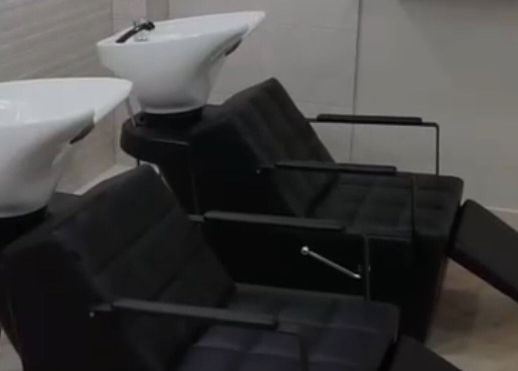 Modern wash stations at Autumn & Easton salon, Glasgow, Scotland, GB. Perfect for beauty treatments.