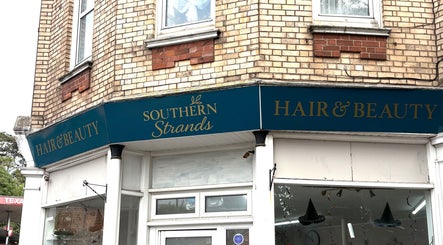 Exterior of Southern Strands Hair Co located in Paignton, England, GB, showcasing its stylish storefront.