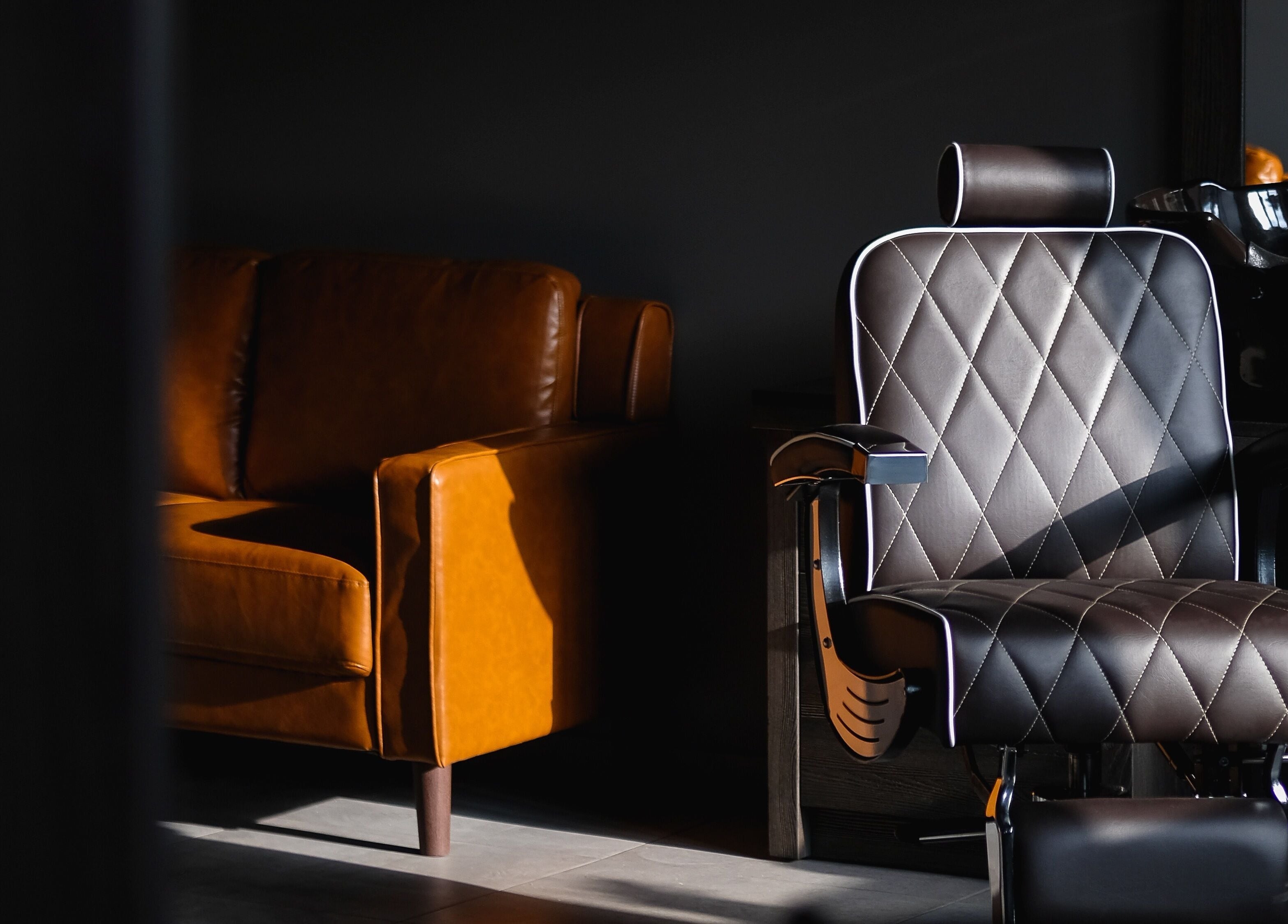 Luxurious leather chair in Skaistuma ēra salon, Jelgava, LV, with elegant interior design.