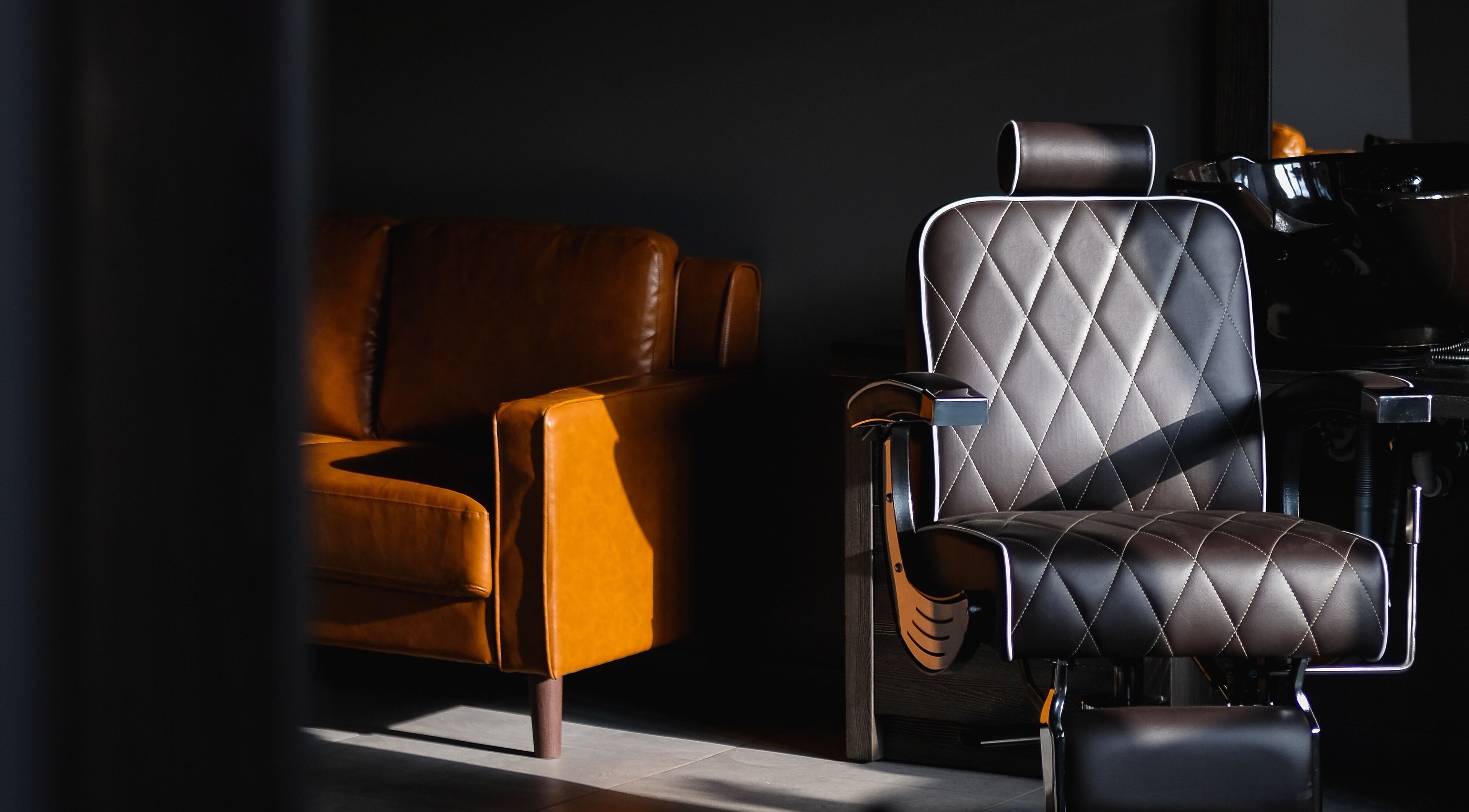 Luxurious leather chair in Skaistuma ēra salon, Jelgava, LV, with elegant interior design.