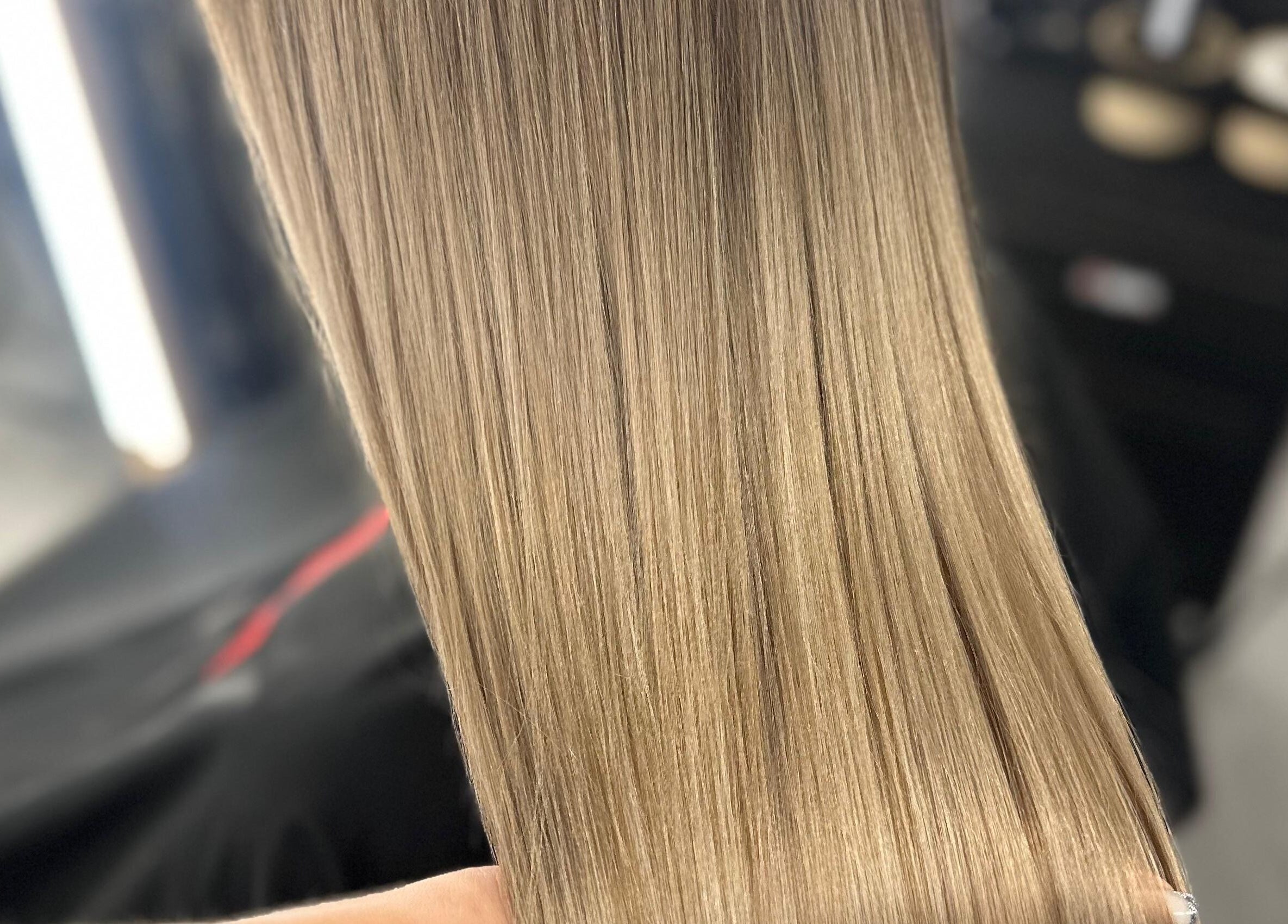 Smooth, shiny hair treatment at Skaistuma ēra, Jelgava, LV showcasing professional salon results.