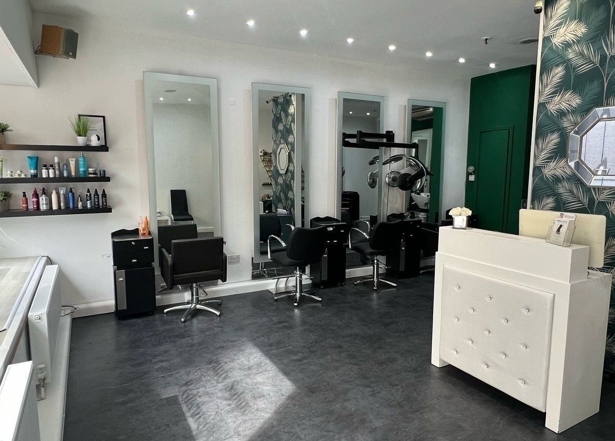 Elegant salon at 8 Harrow Place, London, England, GB with mirrors, styling chairs, and sleek decor.