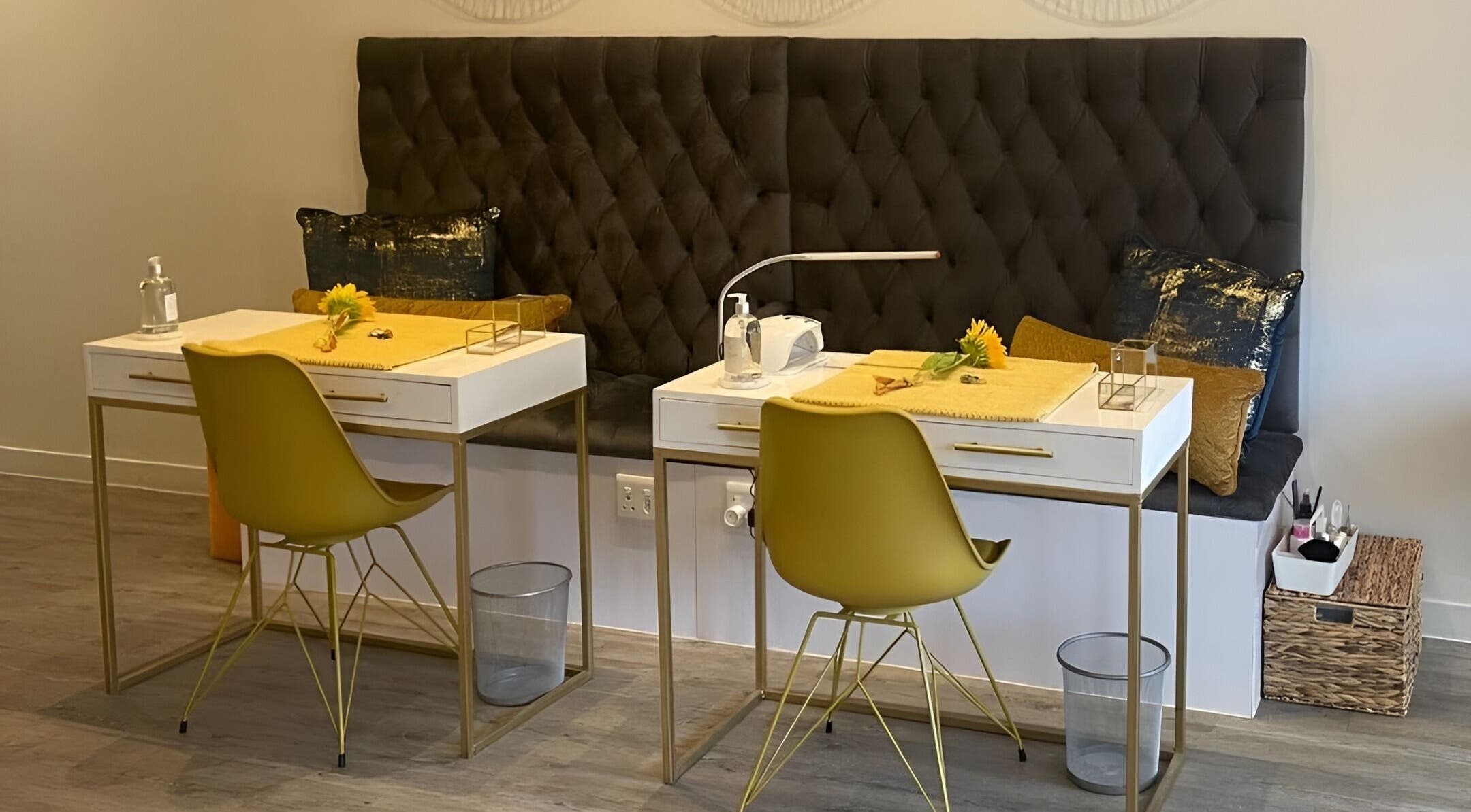 Modern manicure station at Sana Salon, Cape Town, Western Cape, ZA featuring plush seating and chic decor.