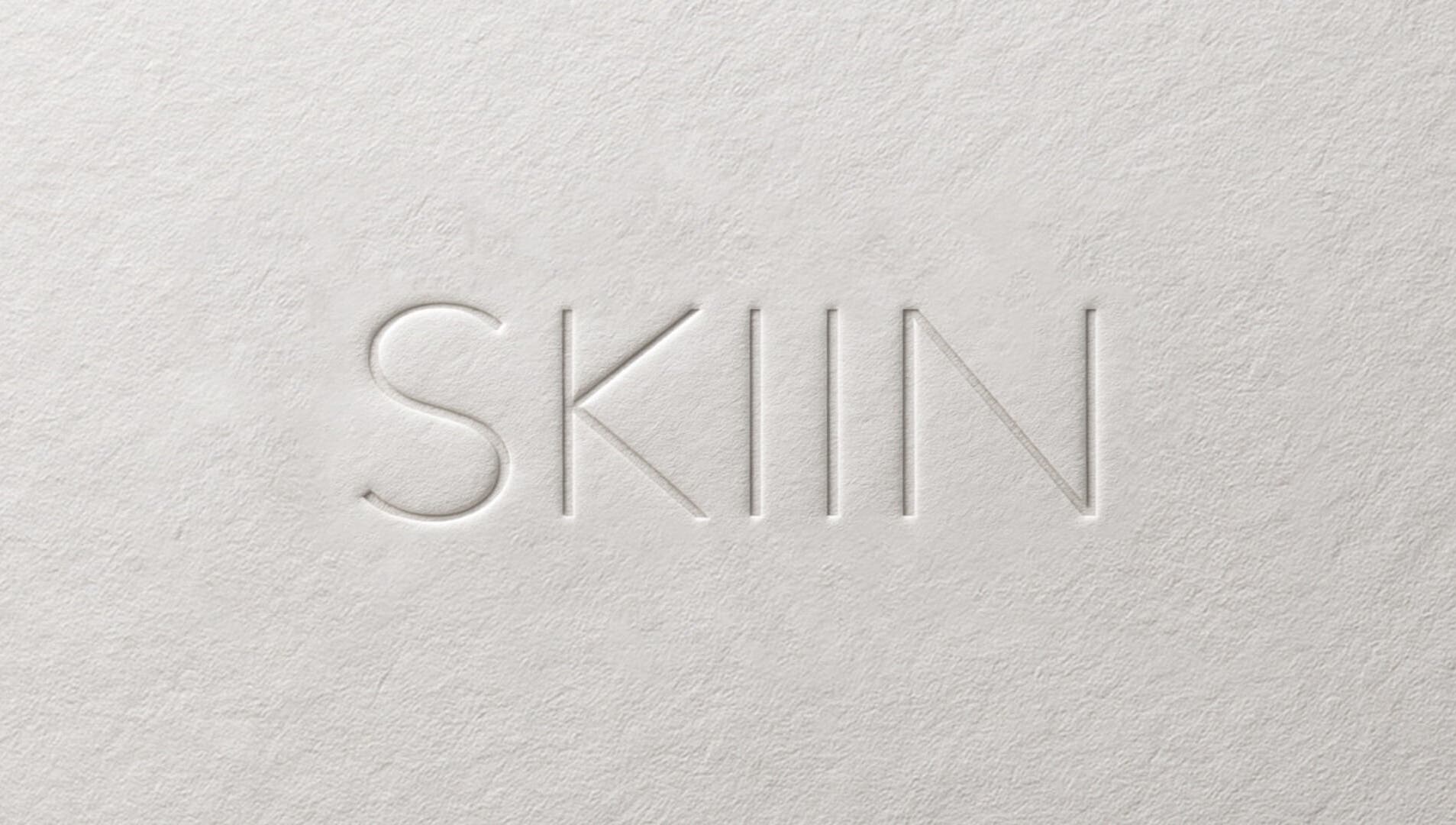 Embossed SKIIN logo on textured paper, Valongo, Porto, PT.