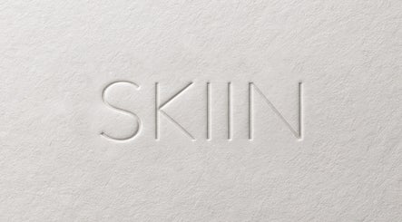 Embossed SKIIN logo on textured paper, Valongo, Porto, PT.