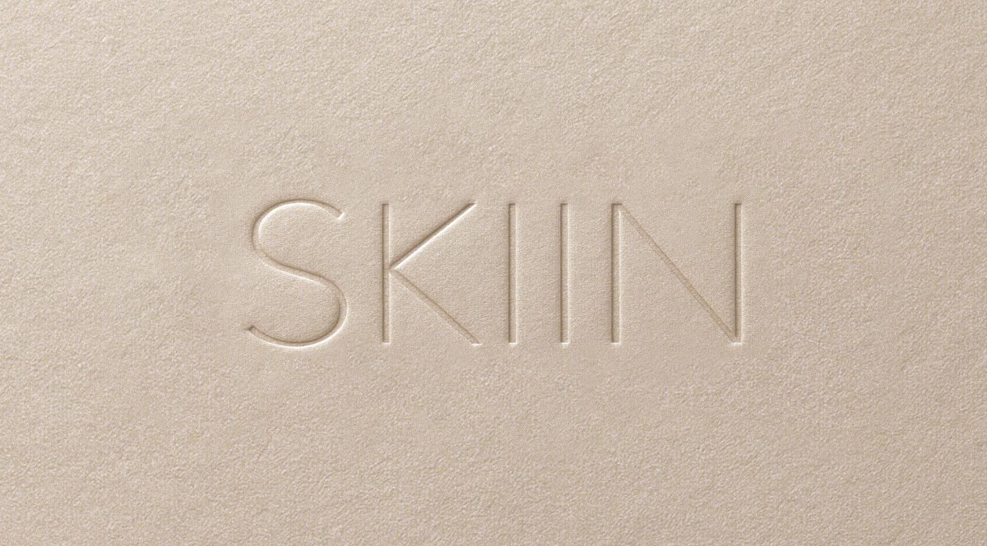 Embossed SKIIN logo on textured background at SKIIN (at VARD, Matosinhos), Matosinhos, Porto, PT.