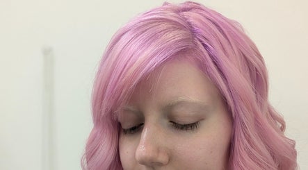 Vibrant pink hair styled at Hair Creations by Pagie Xox, Maryville, Illinois, US.
