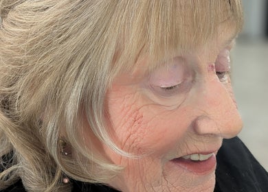 Elegant hairstyle for mature woman at Hair Creations by Pagie Xox in Maryville, Illinois, US.