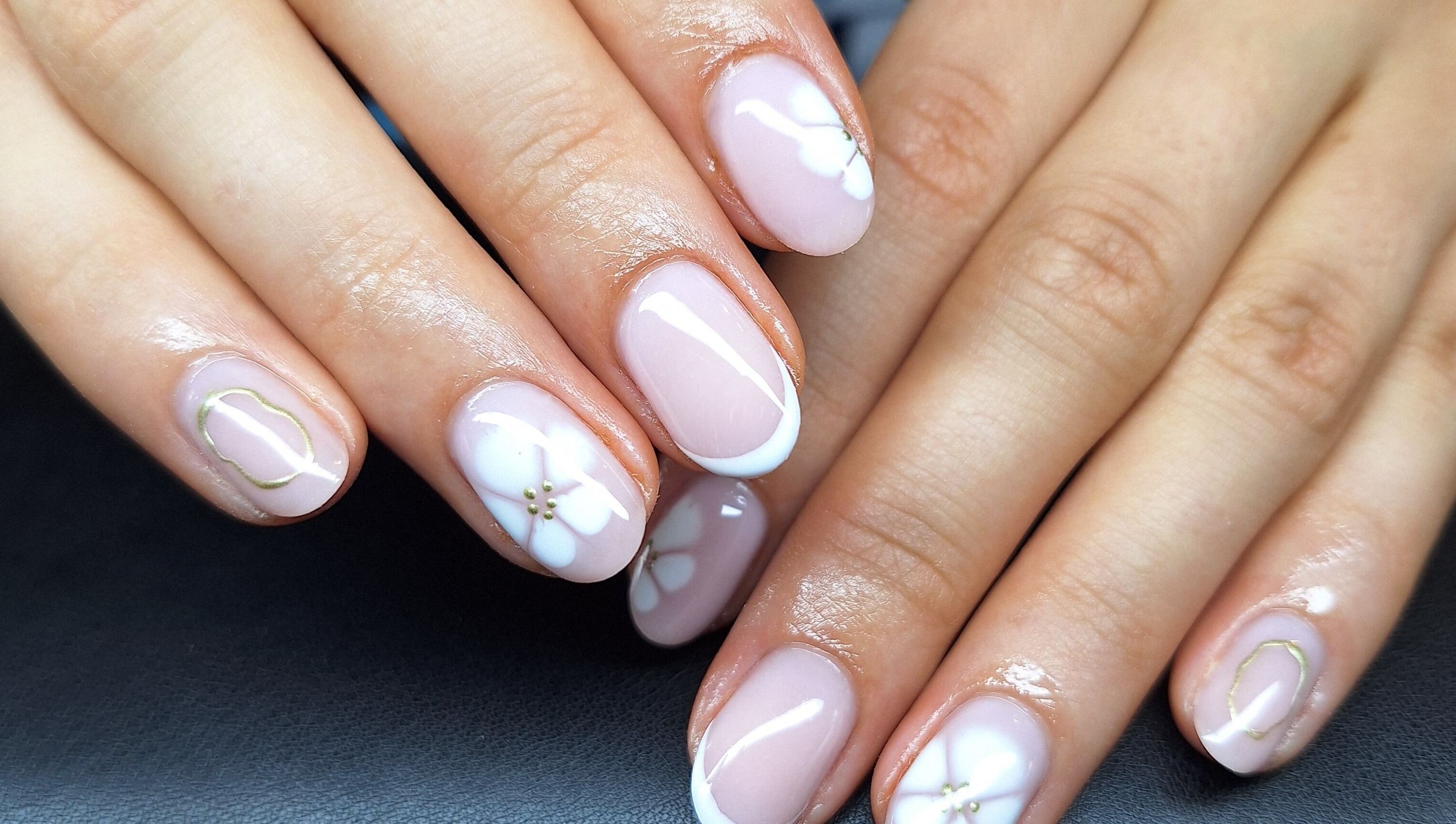 Elegant floral nail art at Bee Beautiful, Caistor, England, GB showcasing sophisticated beauty.