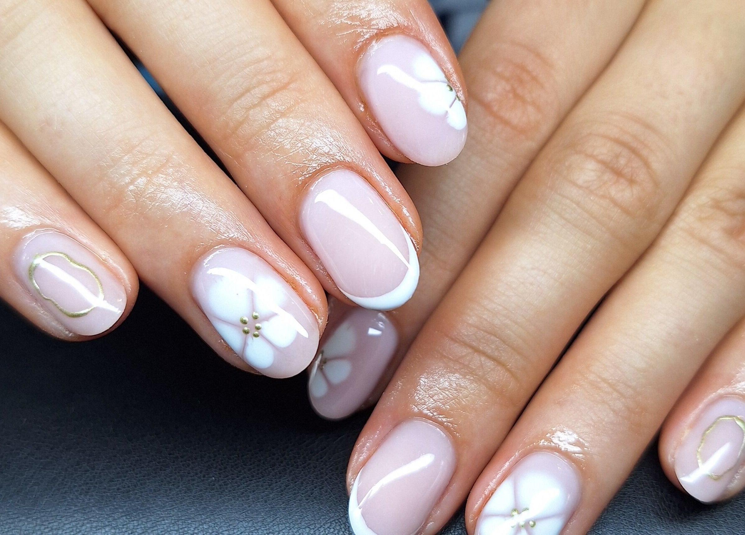Elegant floral nail art at Bee Beautiful, Caistor, England, GB showcasing sophisticated beauty.