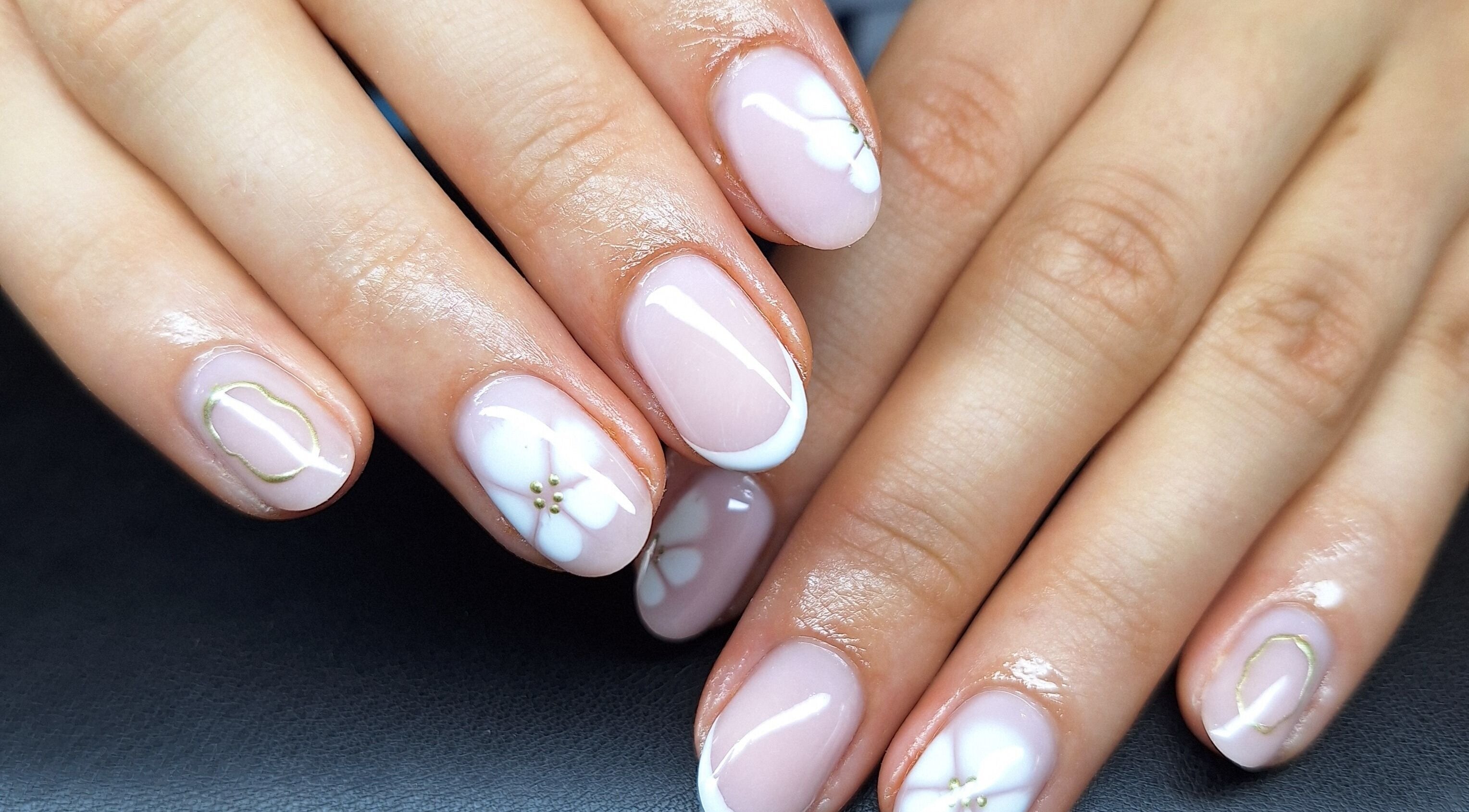 Elegant floral nail art at Bee Beautiful, Caistor, England, GB showcasing sophisticated beauty.