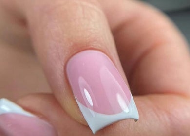 Elegant French manicure at VST Exclusive Spa Salon, Brooklyn, New York, US. Perfect pink and white nail art.