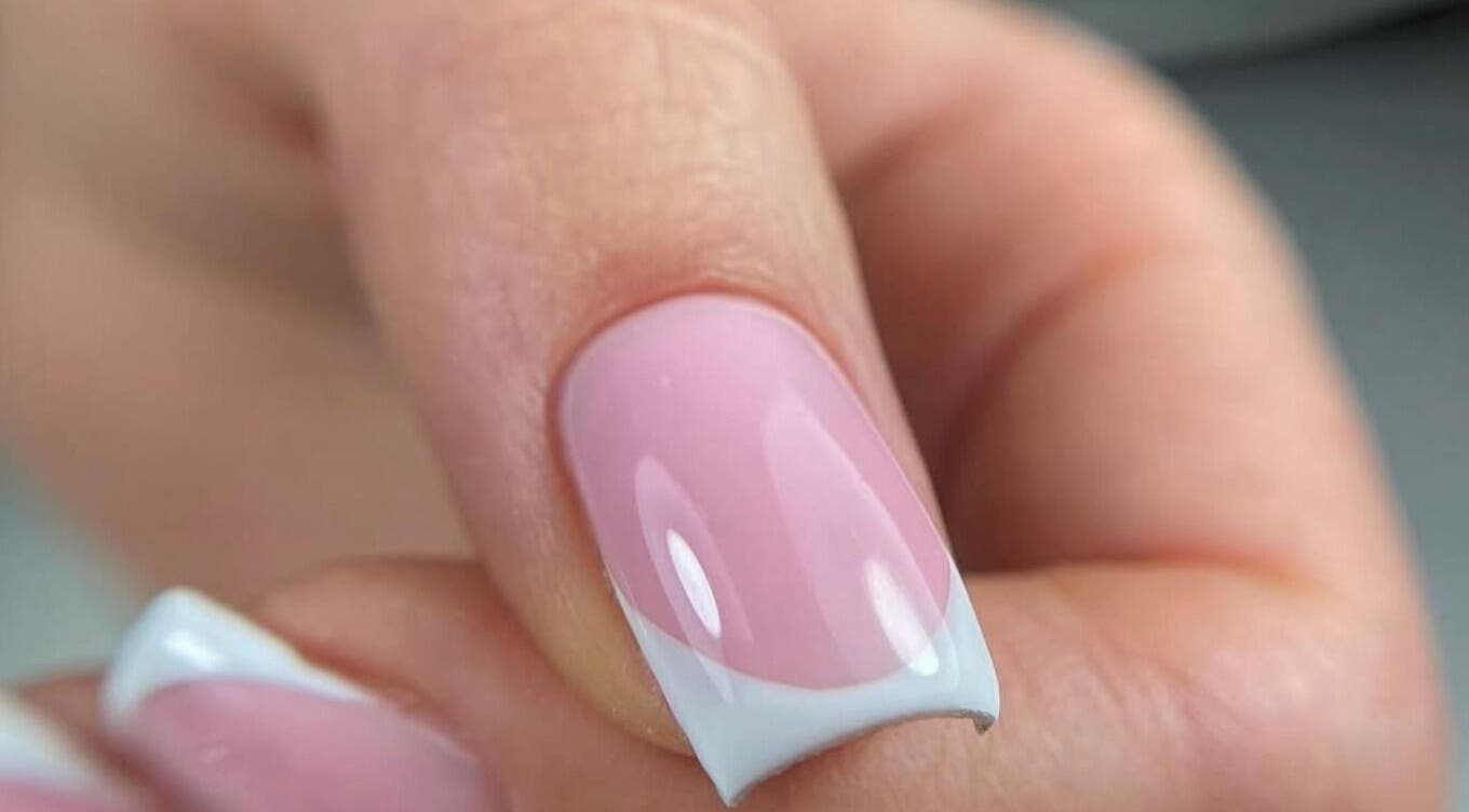 Elegant French manicure at VST Exclusive Spa Salon, Brooklyn, New York, US. Perfect pink and white nail art.
