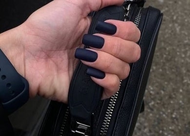 Chic black nails at VST Exclusive Spa Salon, Brooklyn, New York, US reflect modern elegance and style.