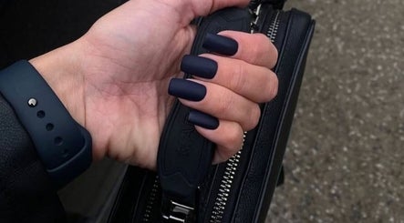 Chic black nails at VST Exclusive Spa Salon, Brooklyn, New York, US reflect modern elegance and style.