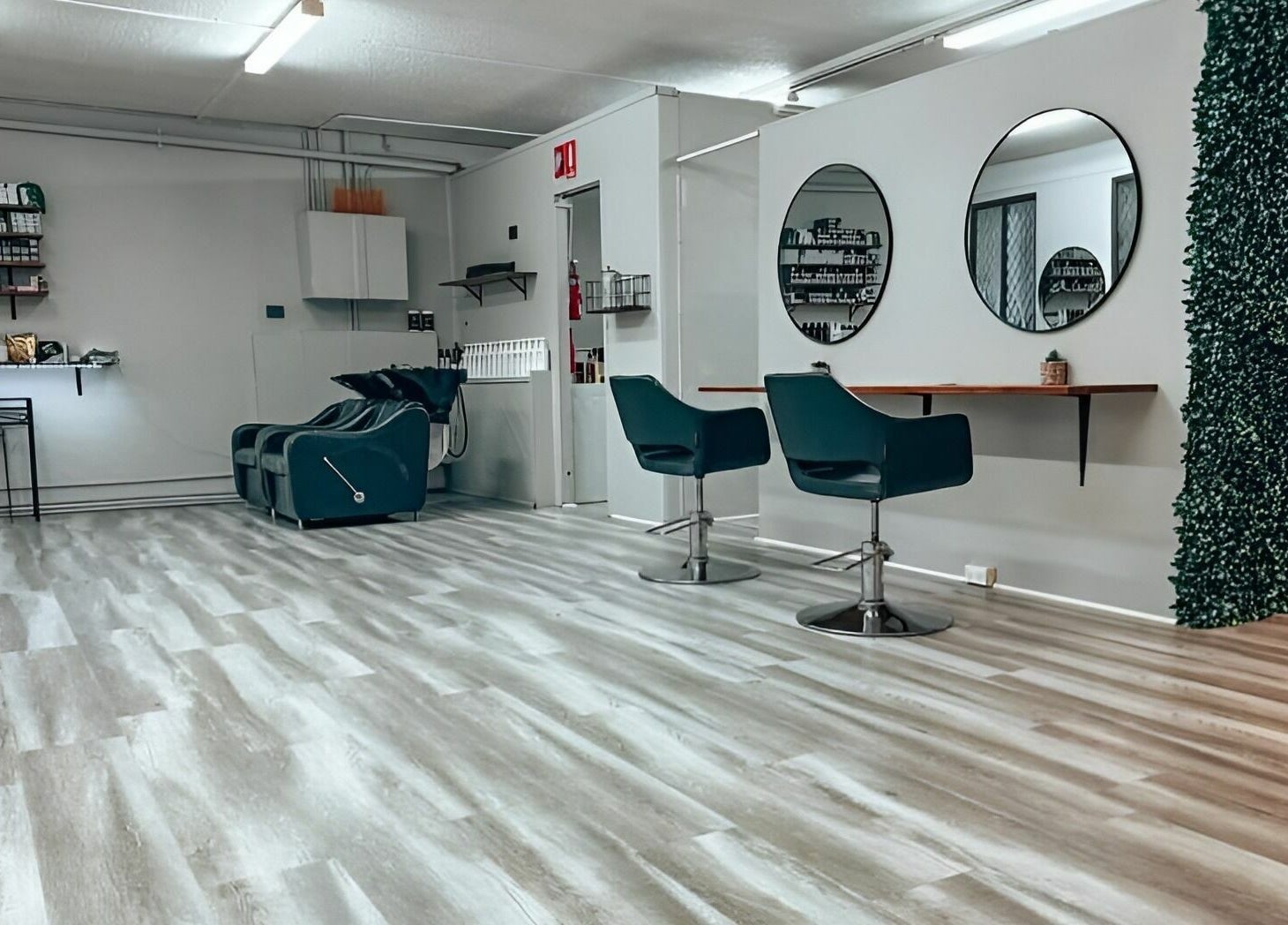 Modern salon interior at M2M By Michael, Penrith, New South Wales, AU with sleek flooring and stylish seating.