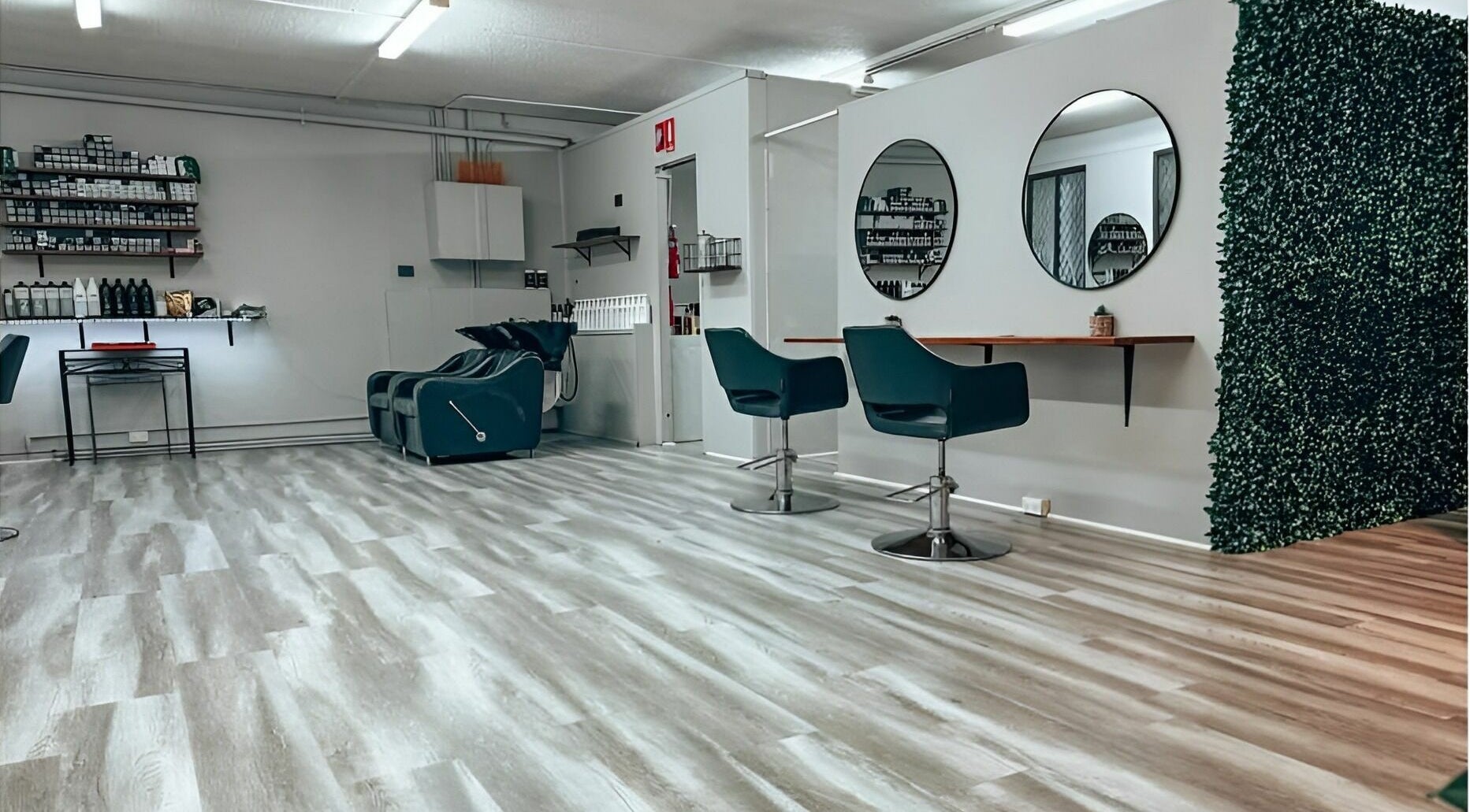 Modern salon interior at M2M By Michael, Penrith, New South Wales, AU with sleek flooring and stylish seating.