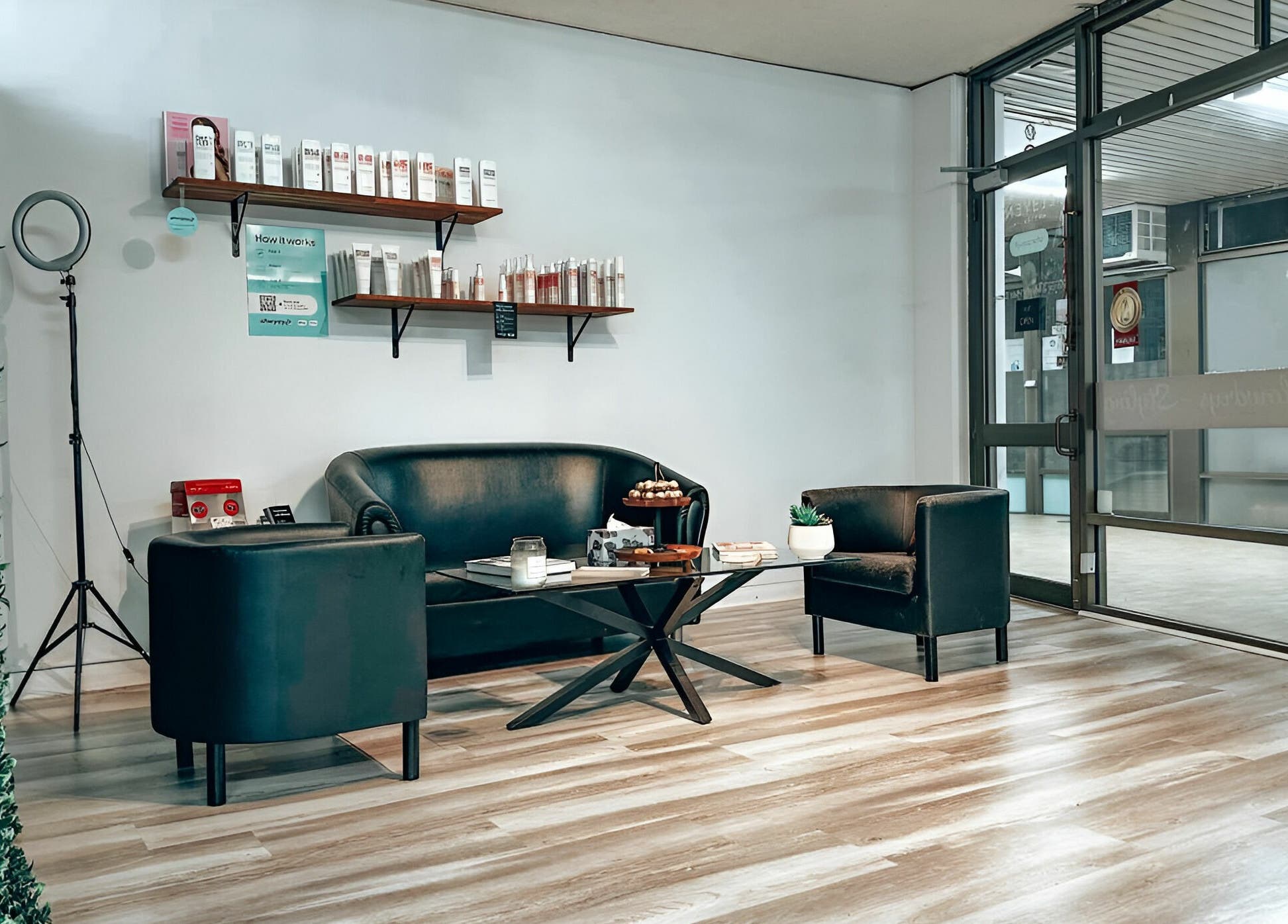 Cozy seating area at M2M By Michael, Penrith, New South Wales, AU with modern decor and beauty products.