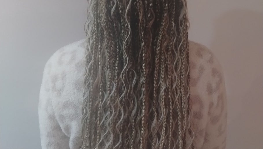 Detailed view of stylish braids at Isl Hair Care in Lawrence, Kansas, US.