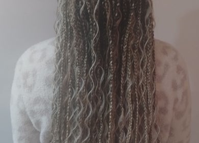 Detailed view of stylish braids at Isl Hair Care in Lawrence, Kansas, US.